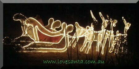 A light display of a sleigh and reindeer