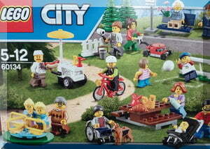 the box of a new Lego set which has a wheelchair and a baby.