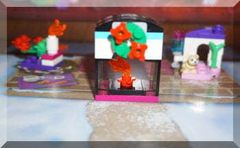 A Lego fire under a wreath