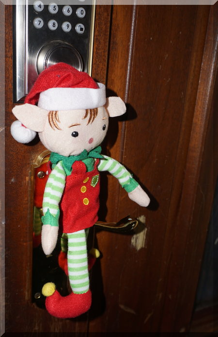 Christmas elf at the front door